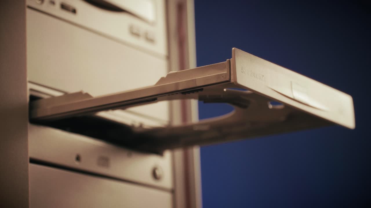 Using CD circle disk for old computer. Dvd player, disc drive. Music recorder, playing retro computer games. . High quality 4k footage