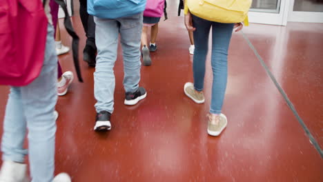 close-up of children legs in school corridor