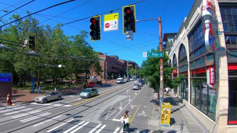 driving under tram cables of seattle city, sunny summer vacation day, washington state, west coast