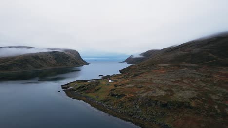 Remote Norwegian Fjord Landscape with a Solitary House