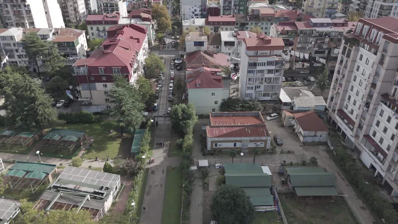 Cinematic daytime drone footage of Batumi skyline and skyscrapers.
