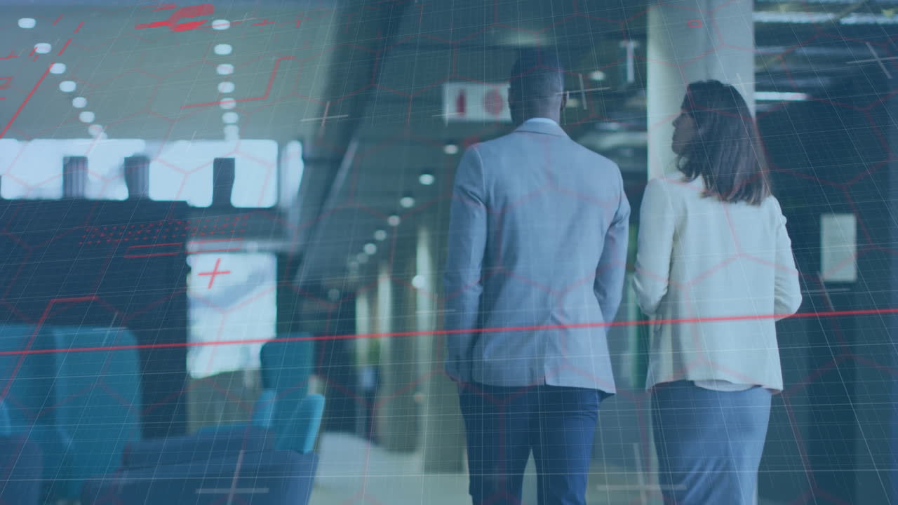 Walking in office corridor, business professionals with data processing animation overlay