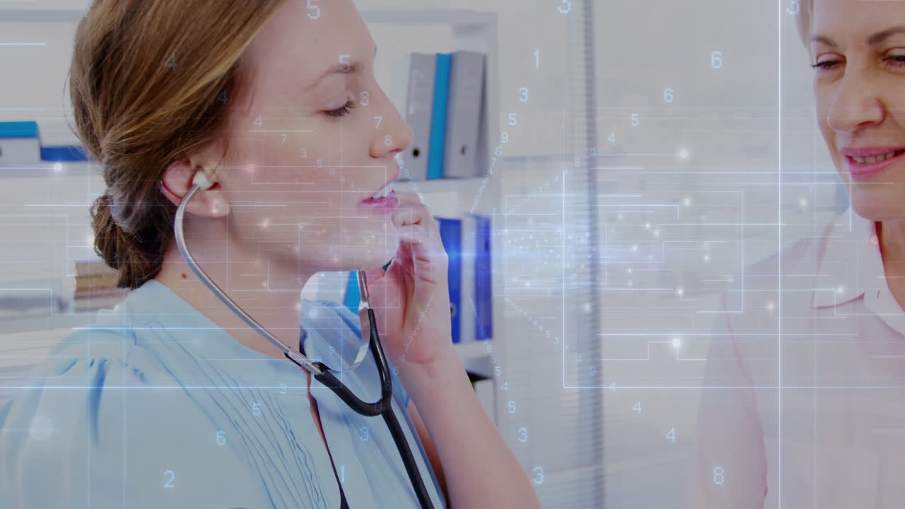 Healthcare professional using animation with digital data overlay in medical office