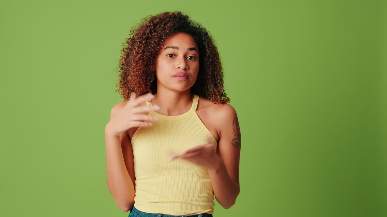 Young Woman Thinking and Shrugging with Uncertainty
