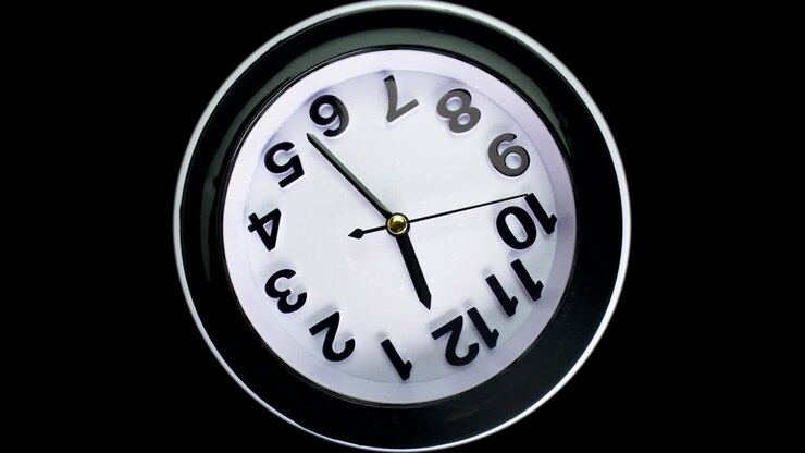 Macro shot of clock face with rapid rotation of all body and almost static seconds arrow. Fast flow of time concept. Real watch shot with wide macro lens close-up view. 4k.