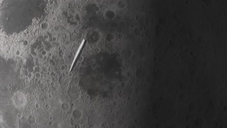oumuamua asteroid interstellar object passing and tumbling through solar system and moon with details of lunar surface with details of impact craters and terrain. 3d science animation prores 4k.
