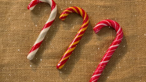 falling snow with christmas candy decoration