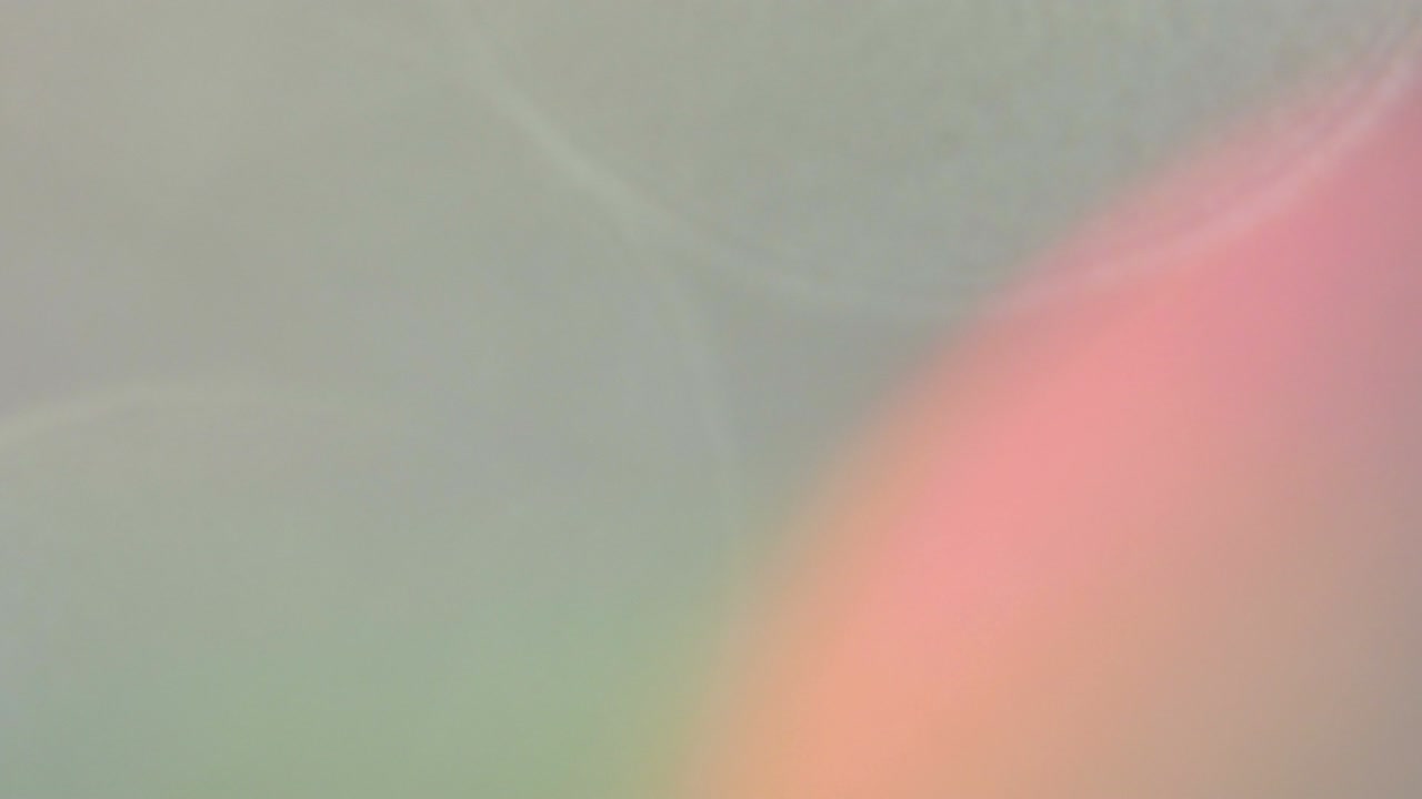 회전 회색, 금색 및 빨간색 보케 배경