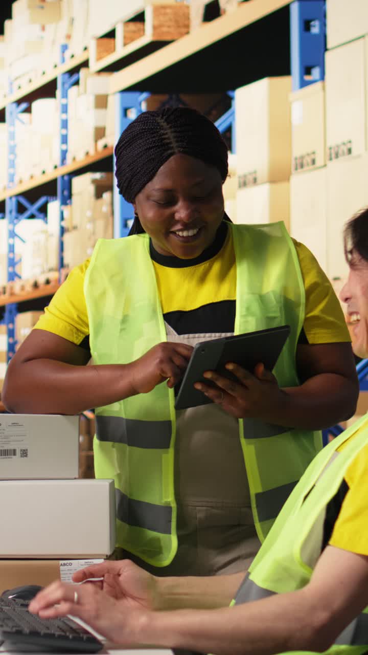 Vertical Video Satisfied coworkers sharing a high five after successful order processing