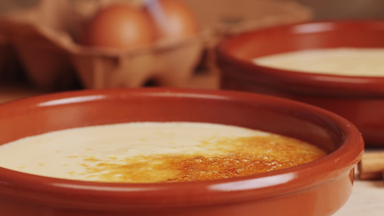Spanish traditional food, catalonian dessert, crema catalana, catalan cream, spanish dessert close up, cooking.