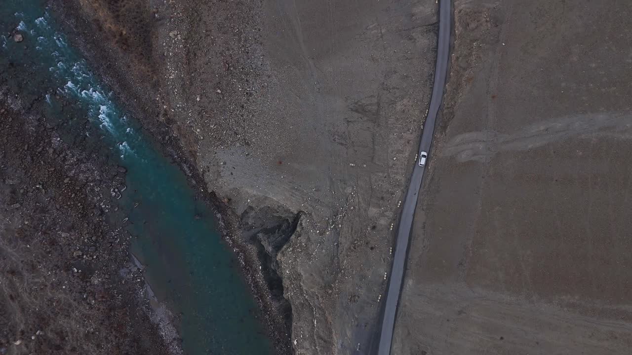 High-Altitude Mountain Road and River View