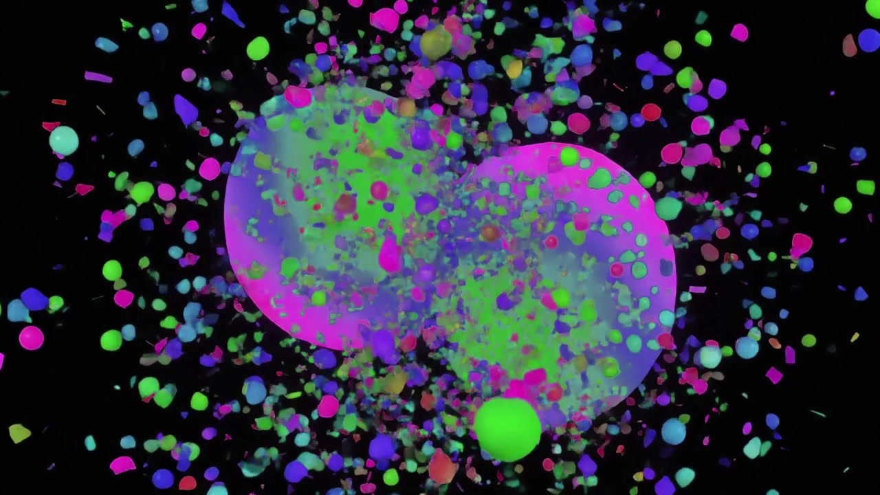 Due sfere colorate che si scontrano ed esplodono in particelle