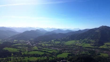 aerial flight over green forest on a mountain side, 4k