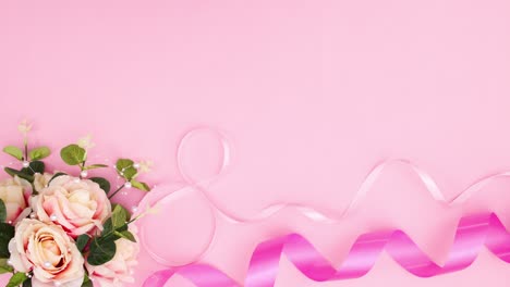 romantic decoration with flowers ribbons and pearls appear on pink theme. stop motion