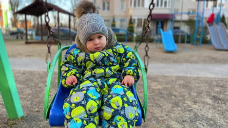 baby in a winter park