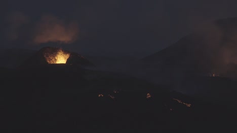 glowing volcano eruption crater at dusk iceland