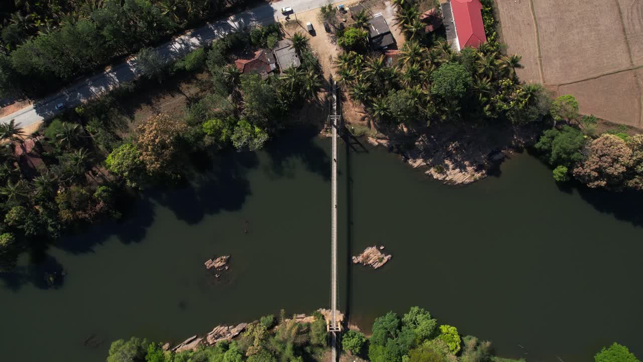 Aerial view of the river's middle-distance hanging bridge