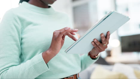 Hands,-woman-and-tablet-in-home-for-app-to-watch