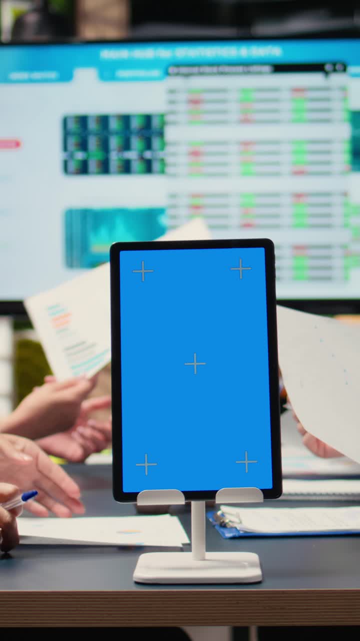 Vertical Video Businesswomen use a copy space display and charts to pitch career vision