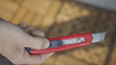 a hand with an old cutter