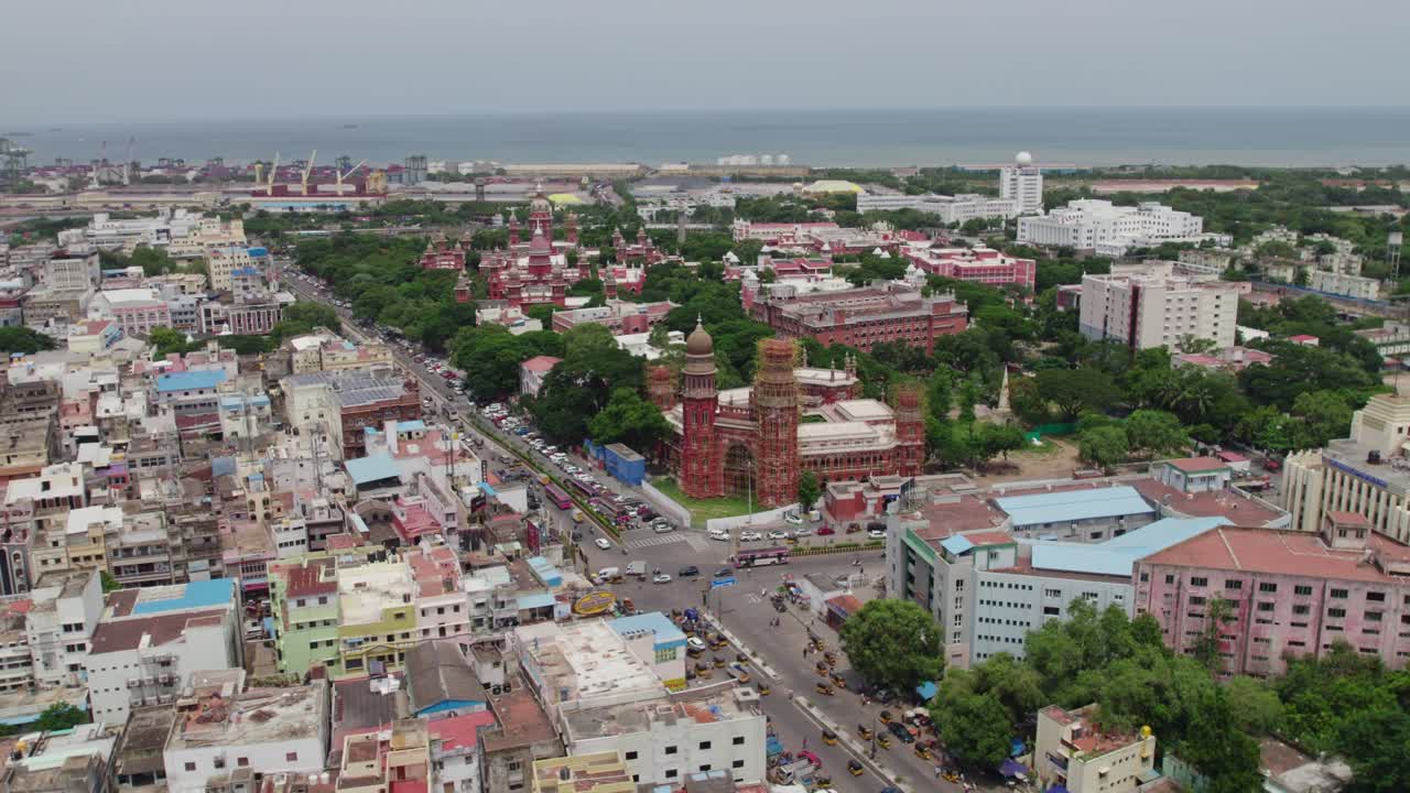 High Court of Judicature at madras background tamil nadu secretariat with port area and heavy traffic with crowded residentials buildings in chennai, tamil nadu, day time push in drone shot