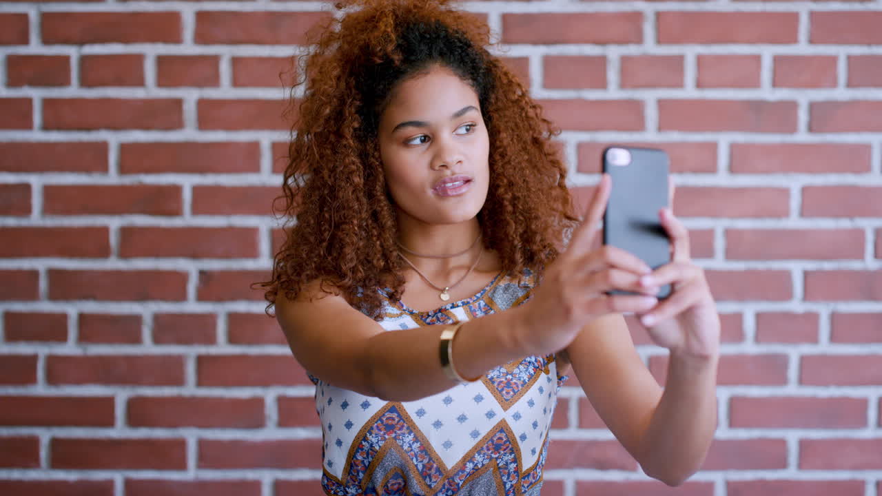Wall, woman and smartphone for selfie