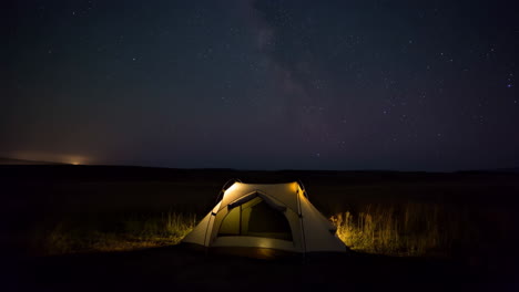 tent under the stars at night
