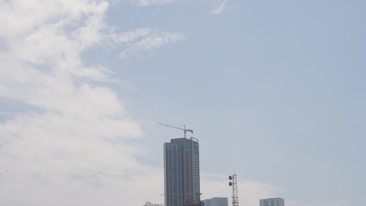 Mumbai City Skyline With Construction Cranes In India