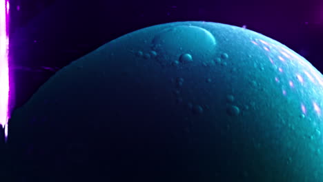 close-up view of a teal planet in space