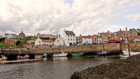 boats docking in scenic crail harbor