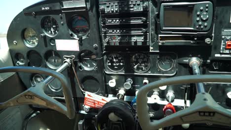 slowmo - inside small airplane cockpit with instruments and flight controls