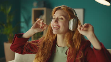 woman dancing and listening to music