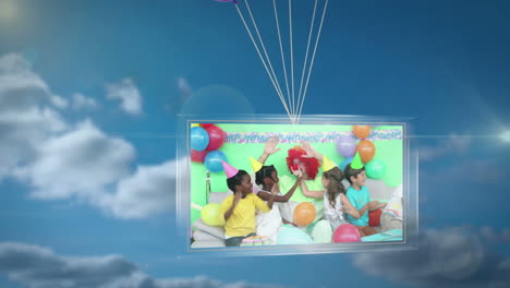 globos que llevan una pantalla que muestra la fiesta de cumpleaños