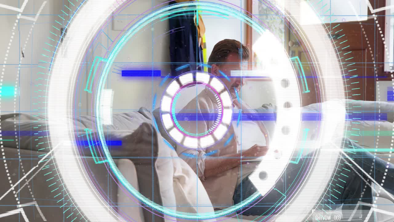 Mature man typing on laptop, circular HUD overlaying view then shrinking, fading for tech work