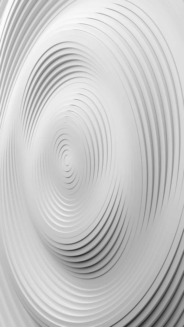 White circular object with black and white background. Vertical looped animation