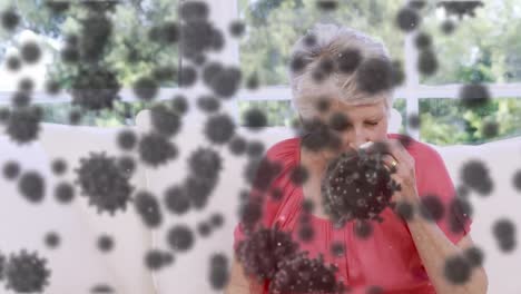 animación de células de covid 19 flotando sobre una mujer enferma