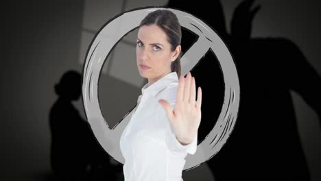 Animation-of-caucasian-woman-with-stop-gesture-over-silhouettes-of-couple