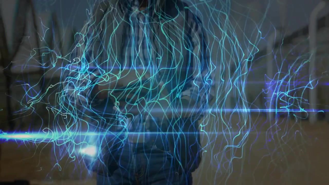 Man holding pistol device testing technology projecting swirling blue-teal energy streams expanding