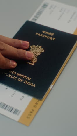 indian passport and boarding pass