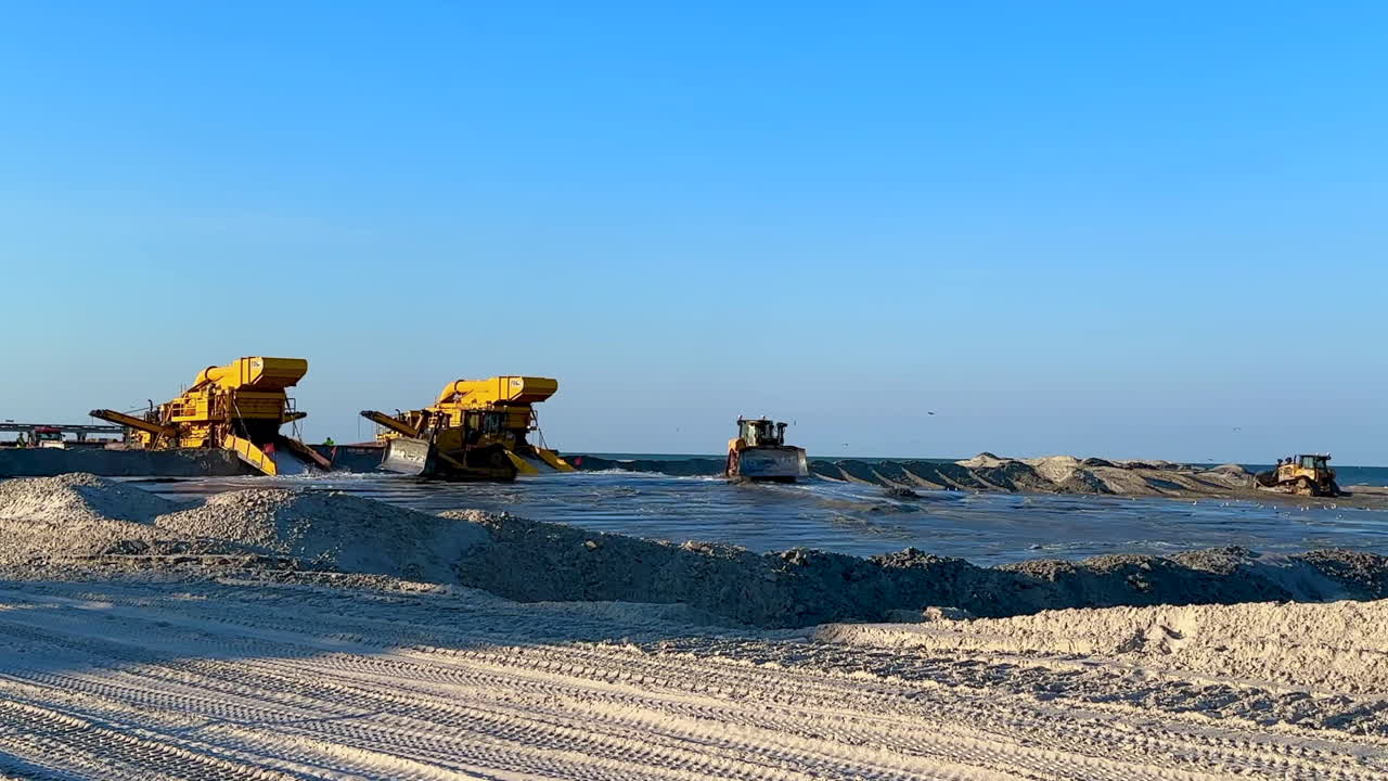 Beach Nourishment Project: Heavy Machinery at Work