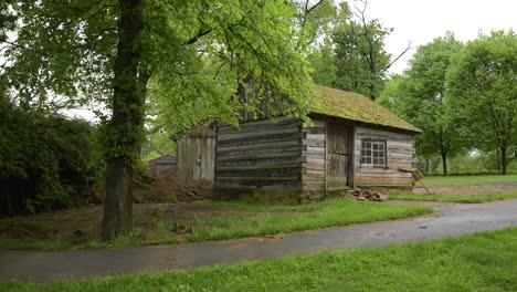 a small colonial home inside around trees