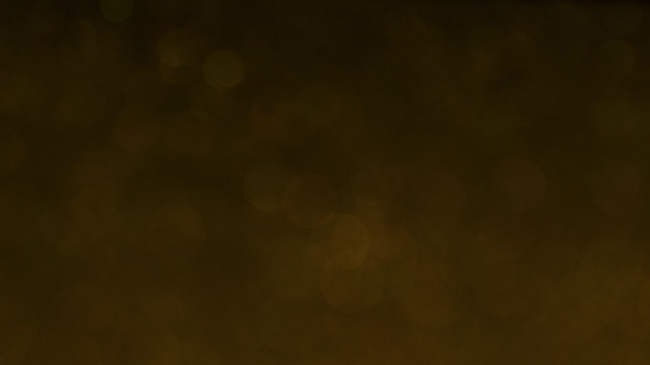 hermoso tiro macro en movimiento de brillos dorados y efecto abstracto