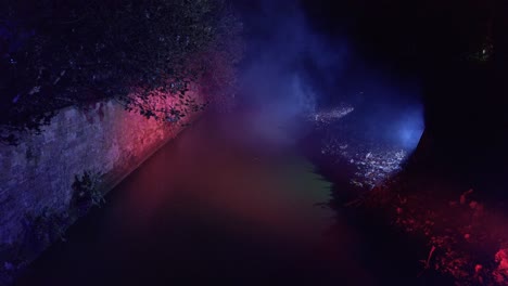night light misty, foggy bridge over water colours at night eerie and spooky
