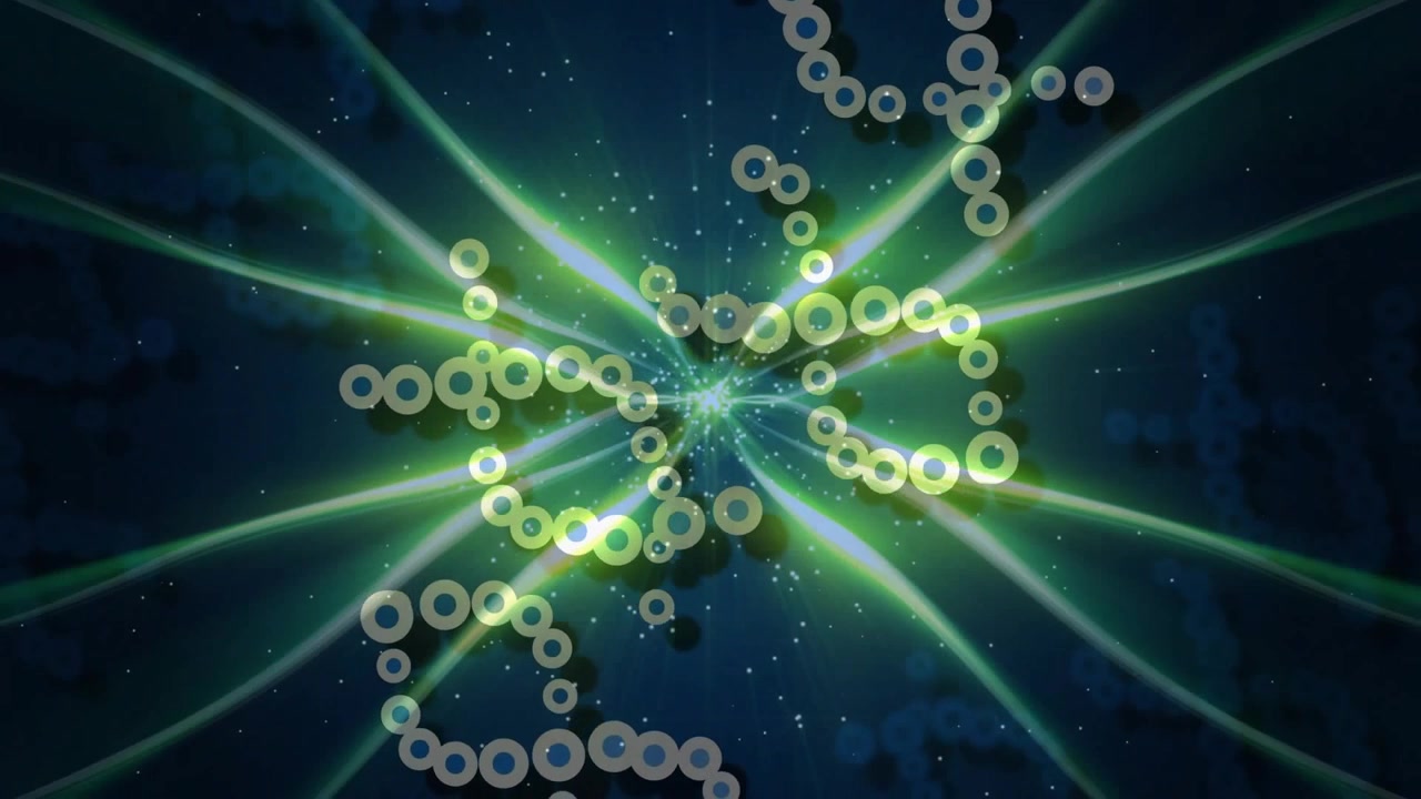 Pulsing central core emitting green ribbon beams and spiraling ring chains, showing outward energy