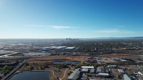 Far-away-distant-drone-shot-of-Downtown-Denver,-CO-in-the-fall