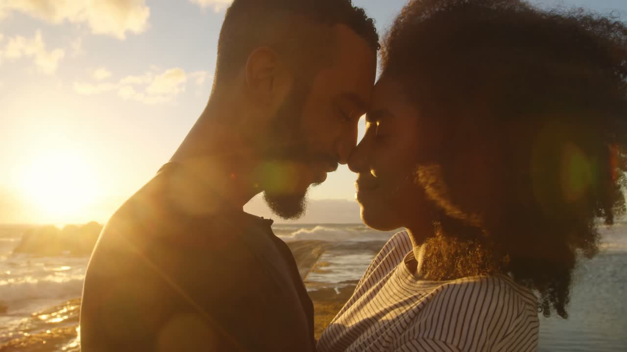 Couple embracing each other on the beach 4k