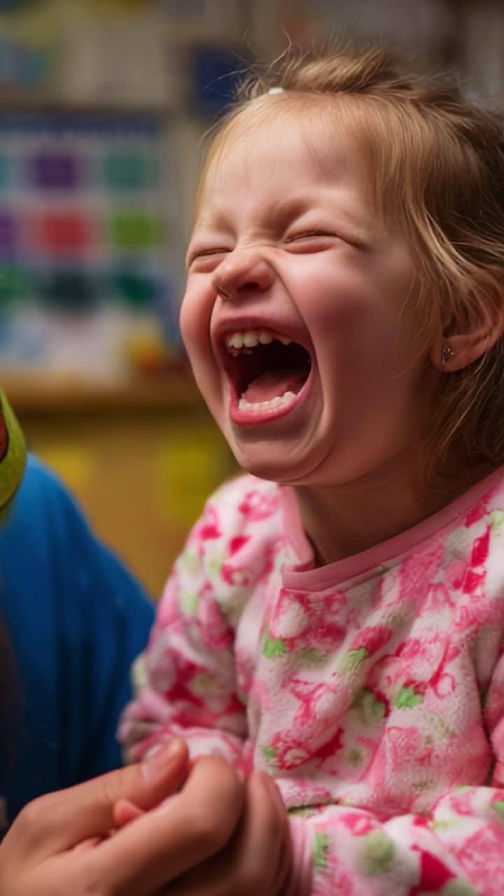 A joyful child burst into laughter, radiating pure happiness in a vibrant, colorful environment, showcasing the innocence and delight of childhood while sharing a heartfelt moment with a loved one