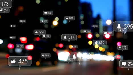 animación de iconos de redes sociales y puntos de luz contra la vista borrosa del tráfico nocturno de la ciudad.