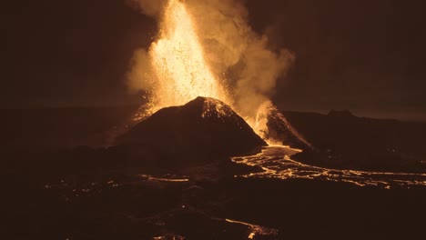 powerful eruption from volcano cone at night iceland 2021