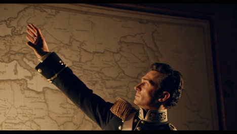 historical figure in military uniform, reviewing a map
